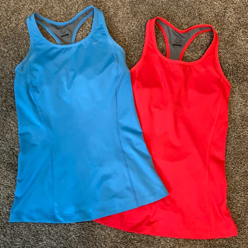 Two Nike Women’s tank tops